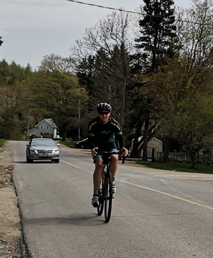 Josh, finishing the climb with a smile