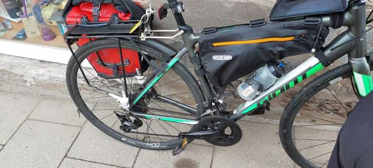 One rear stay came loose on Lorraine's pannier on Day 18, the 11th day of using the road bikes. I wanted Jubilee clips on the other 3 sides just in case, and found one on the Reilly had also come apart from its base.