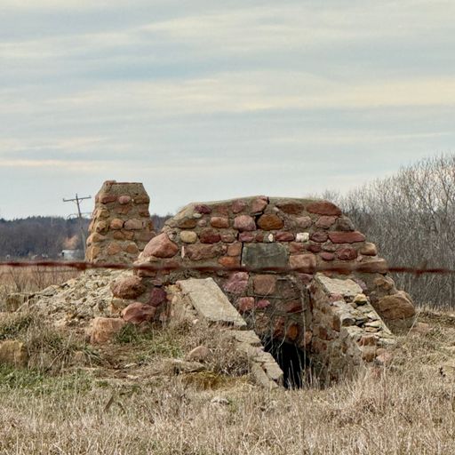 Dunno? Has a chimney. Little culvert-type 'door'. What is it?