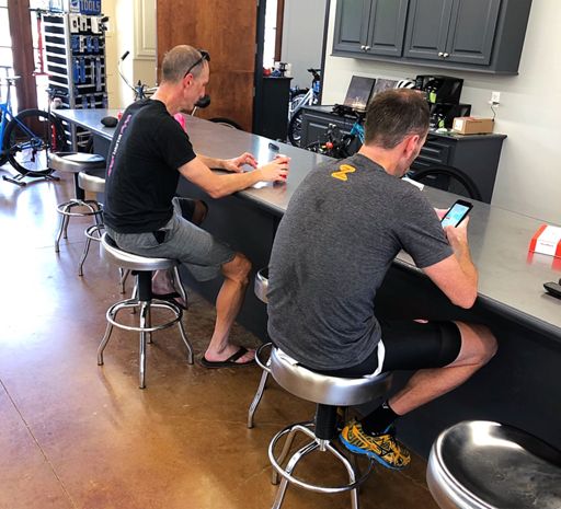 Post ride Strava study hall in the bike shop.