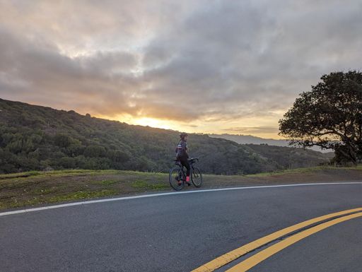 Jasmine gazes victoriously into the sunset after completing her 9th Page.