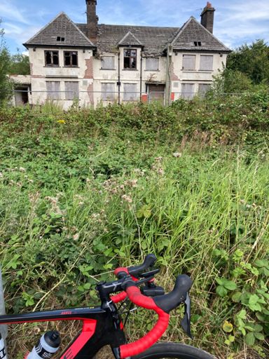 Wincham, shell of derelict Black Greyhound pub