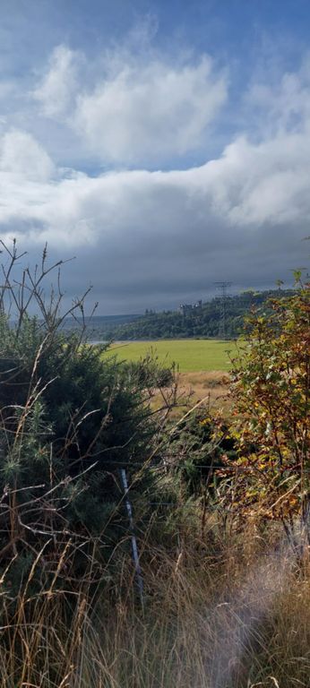 Carbisdale Castle, viewed from the A837 just before joining the A836. Built 1905-17 for the then Duchess of Sutherland. Recently changed hands having been on the market for £1.2m.  https://en.wikipedia.org/wiki/Carbisdale_Castle & https://www.bbc.co.uk/news/uk-scotland-highlands-islands-63143835 & http://www.archhighland.org.uk/news.asp?newsid=331