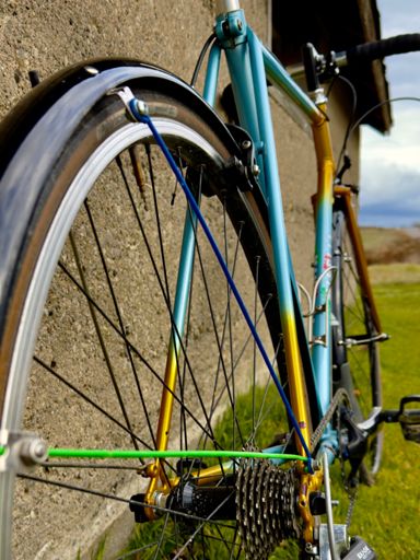 Old fender stays broke so I used some colourful coat hangers to replace them 