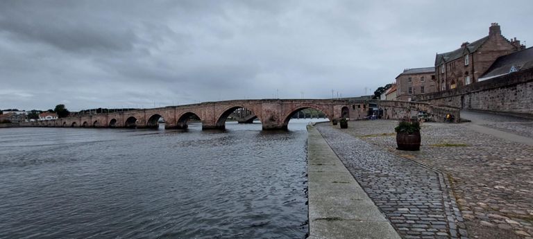 Berwick Old Bridge, built between 1611 and 1634, 15 arches spanning 1165ft/355m. Bits of Royal Tweed Bridge and Royal Border Bridge are in view behind.  https://www.northumberlandarchives.com/tag/berwick-old-bridge/