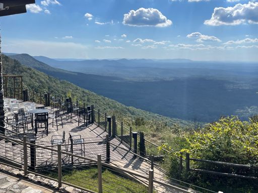 This is one of my favorite views in the state with the other one being on this descent roughly halfway down the side of the mountain to the left where you get an even better view of all those knolls that make up the Skyway Epic ridge line. But this view itself is even better because you can see how the ridge line snakes with the farthest ride center of screen a bit to the right of the smoke but even farther in the distance is part of the same ridge line where I am standing (on Cheaha).