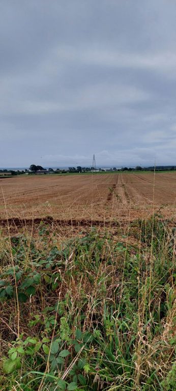 River Esk, 1-1.5 miles south beyond the fields.