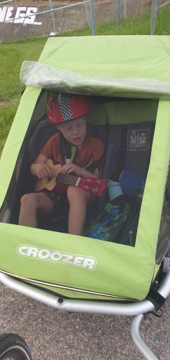 Reuben playing me some music on his way to daycare.